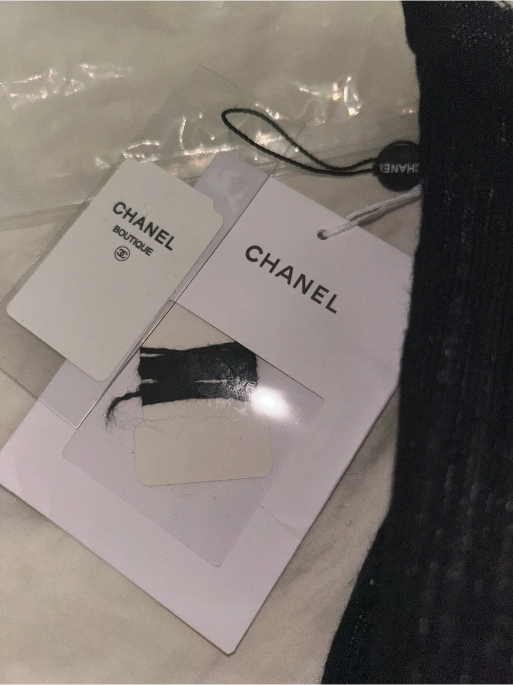 New CHANEL Black Ribbed Short Sleeve Knit Tee with Logo Charm